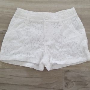 White lace shorts